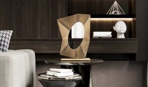 Several books are placed on the table with modern furniture